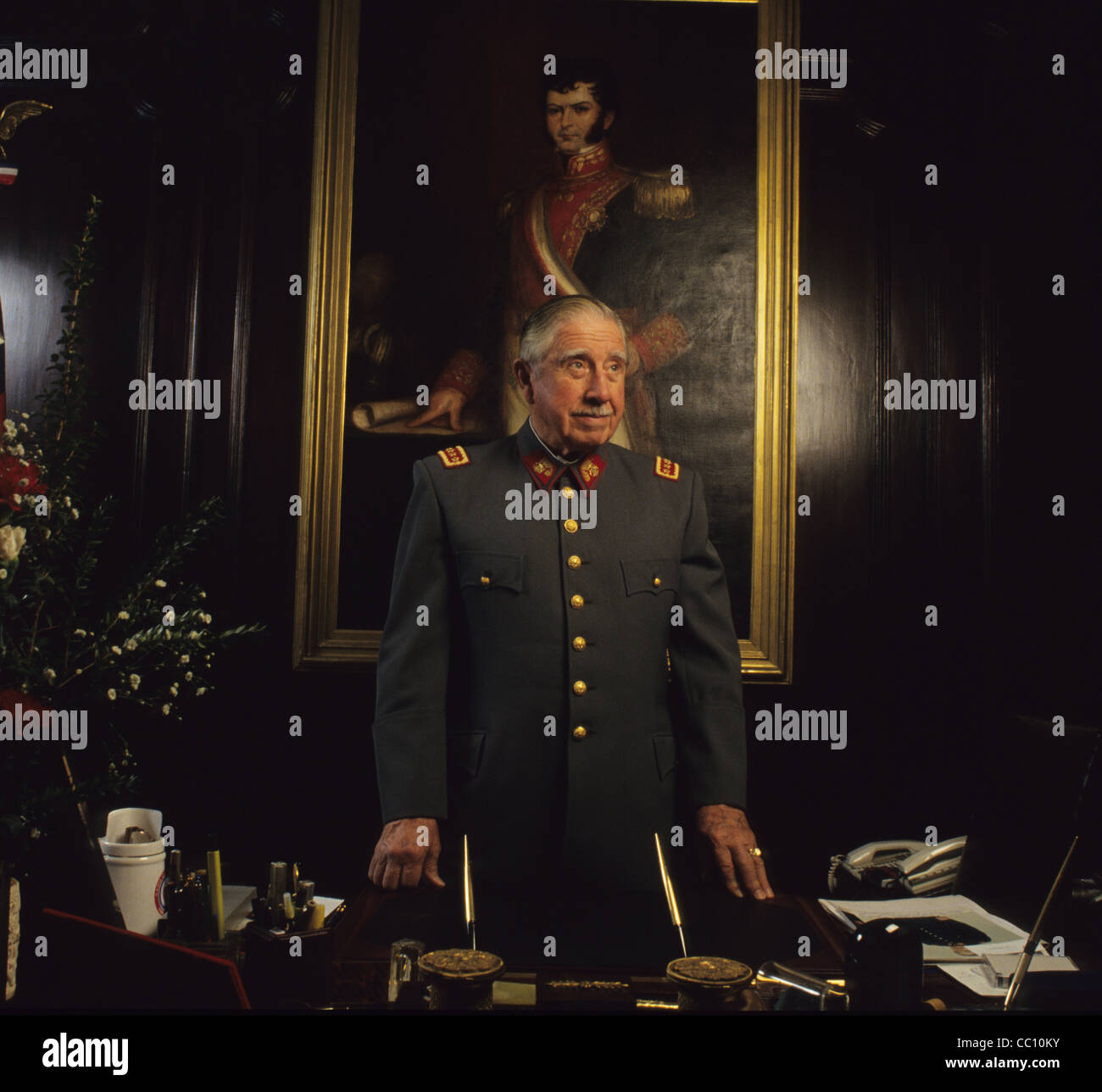 General Augusto Pinochet, Chile with General O^Higgins painting on the background Stock Photo