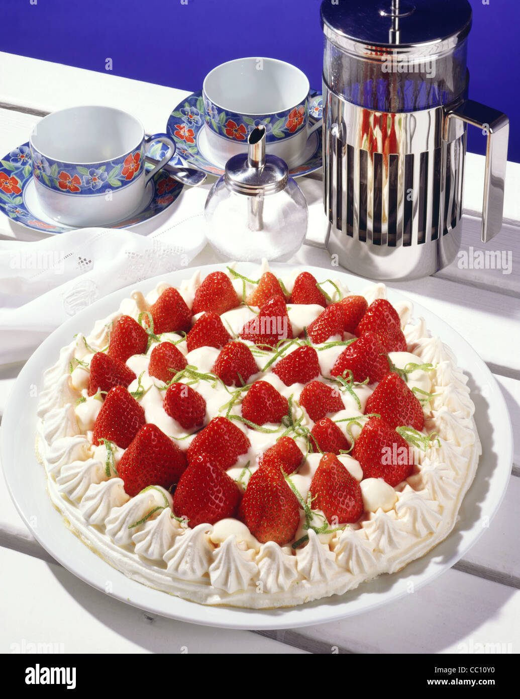 Meringue cake with strawberries and lime cream Stock Photo Alamy