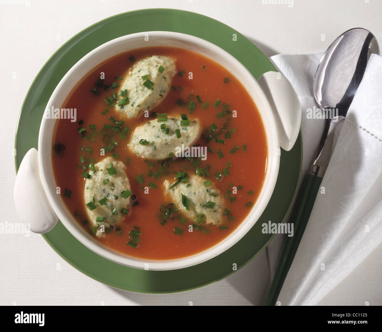 Tomato soup with millet herbs nuggets Stock Photo Alamy