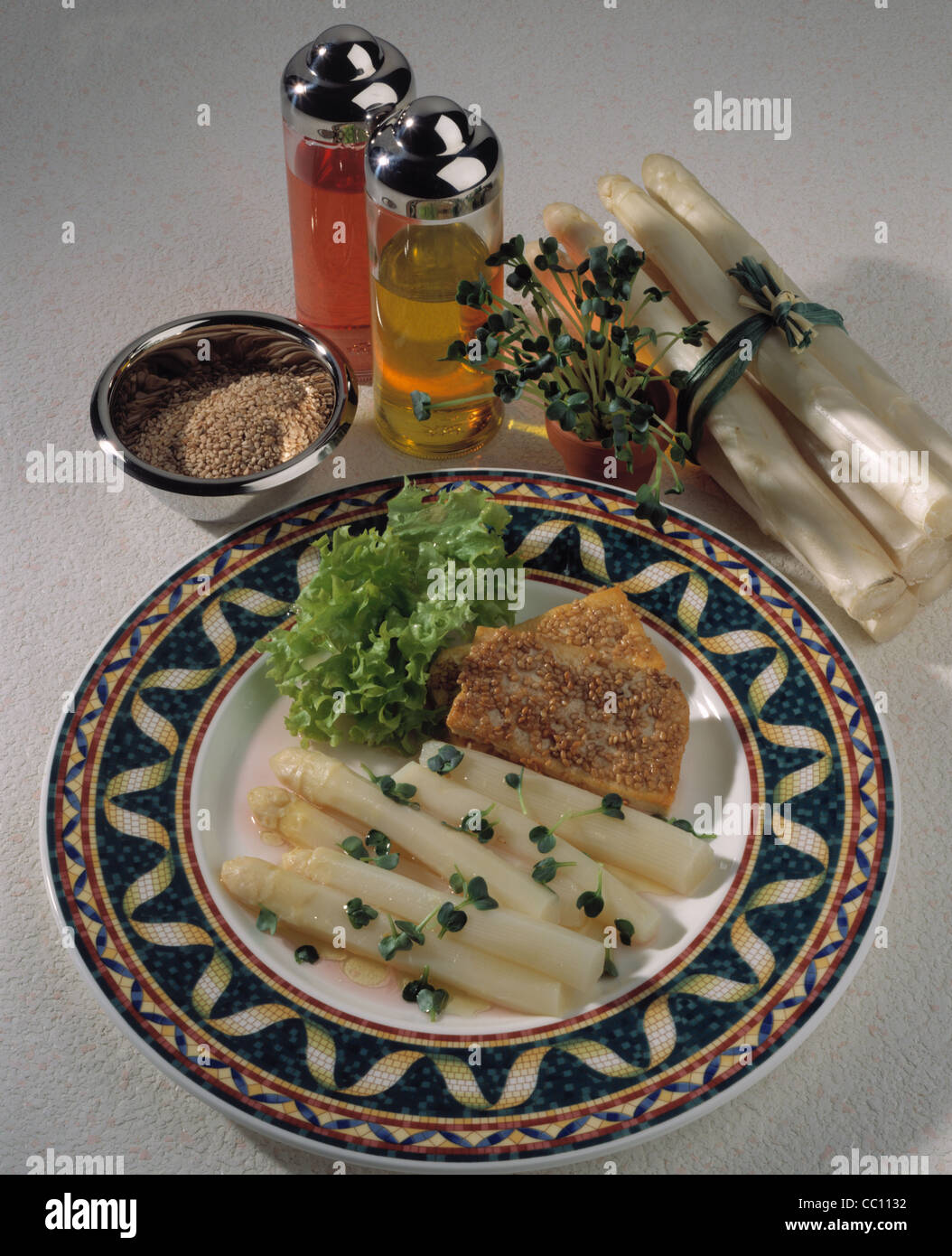 Sesame tofu triangles with asparagus Stock Photo Alamy
