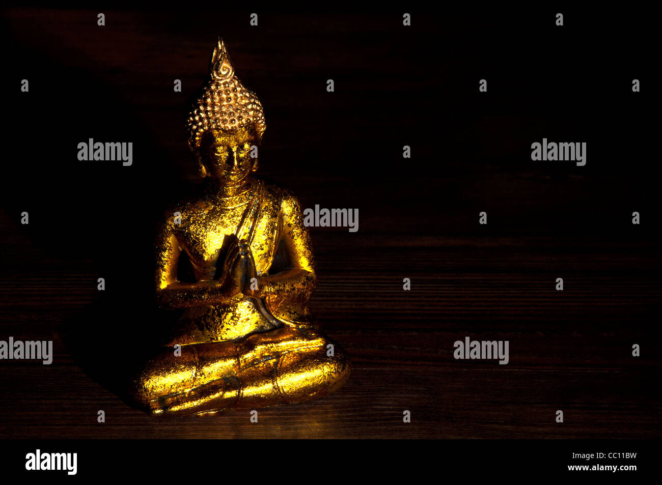 Golden buddha statue, gold buddha, meditating concept, calm