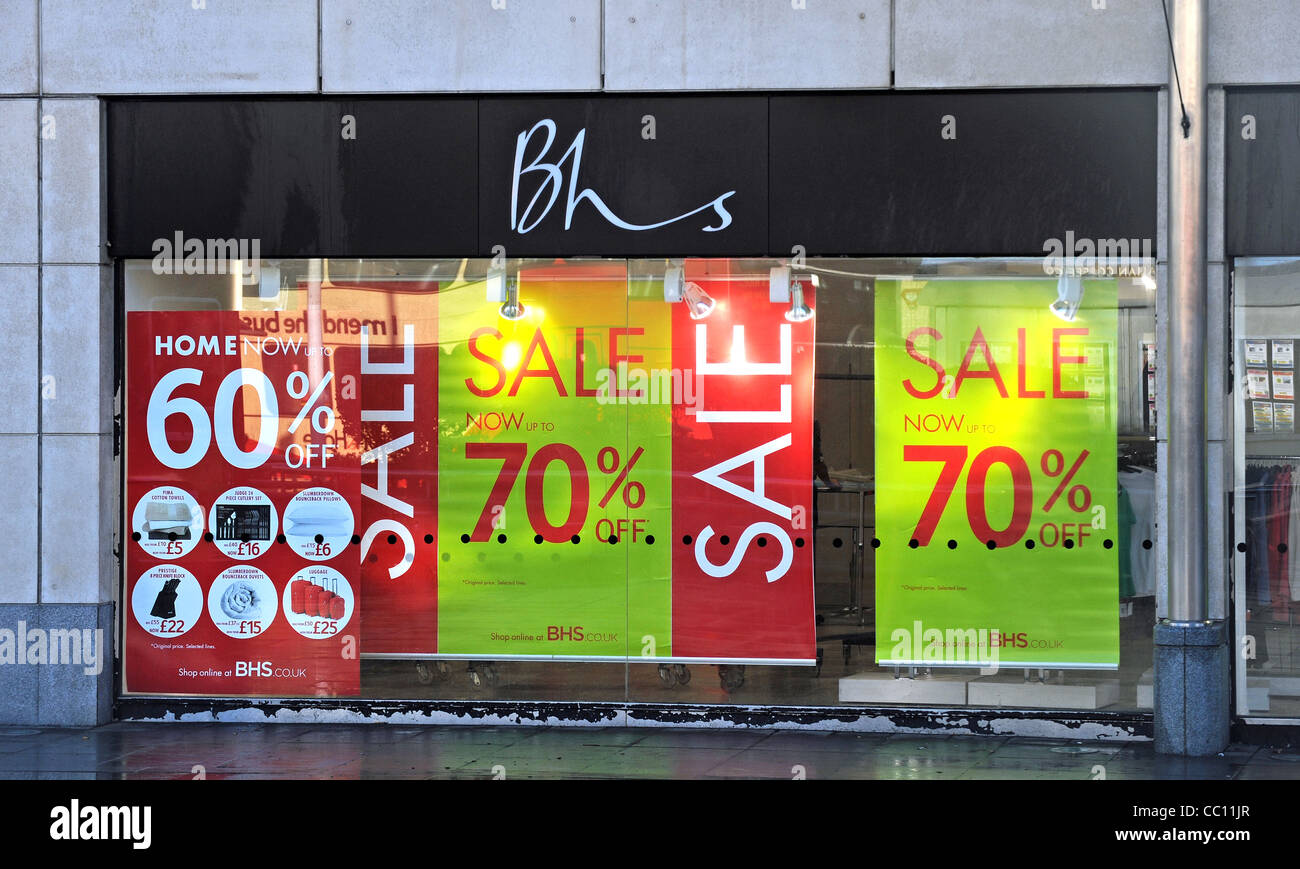 British Home Stores or BHS department store Brighton UK with Sale or Sales posters in window - now closed down Stock Photo