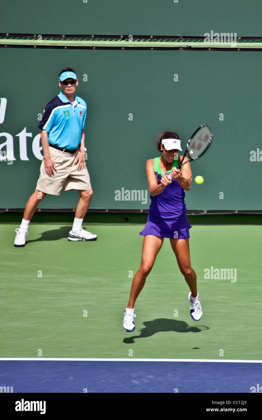 Ana Ivanovich hitting a backhand at the 2011 BNP Paribas Open tournament in Indian Wells Tennis Gardens. © Myrleen Pearson Stock Photo