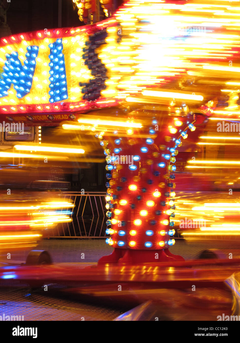 twister fair ground ride at night Stock Photo - Alamy