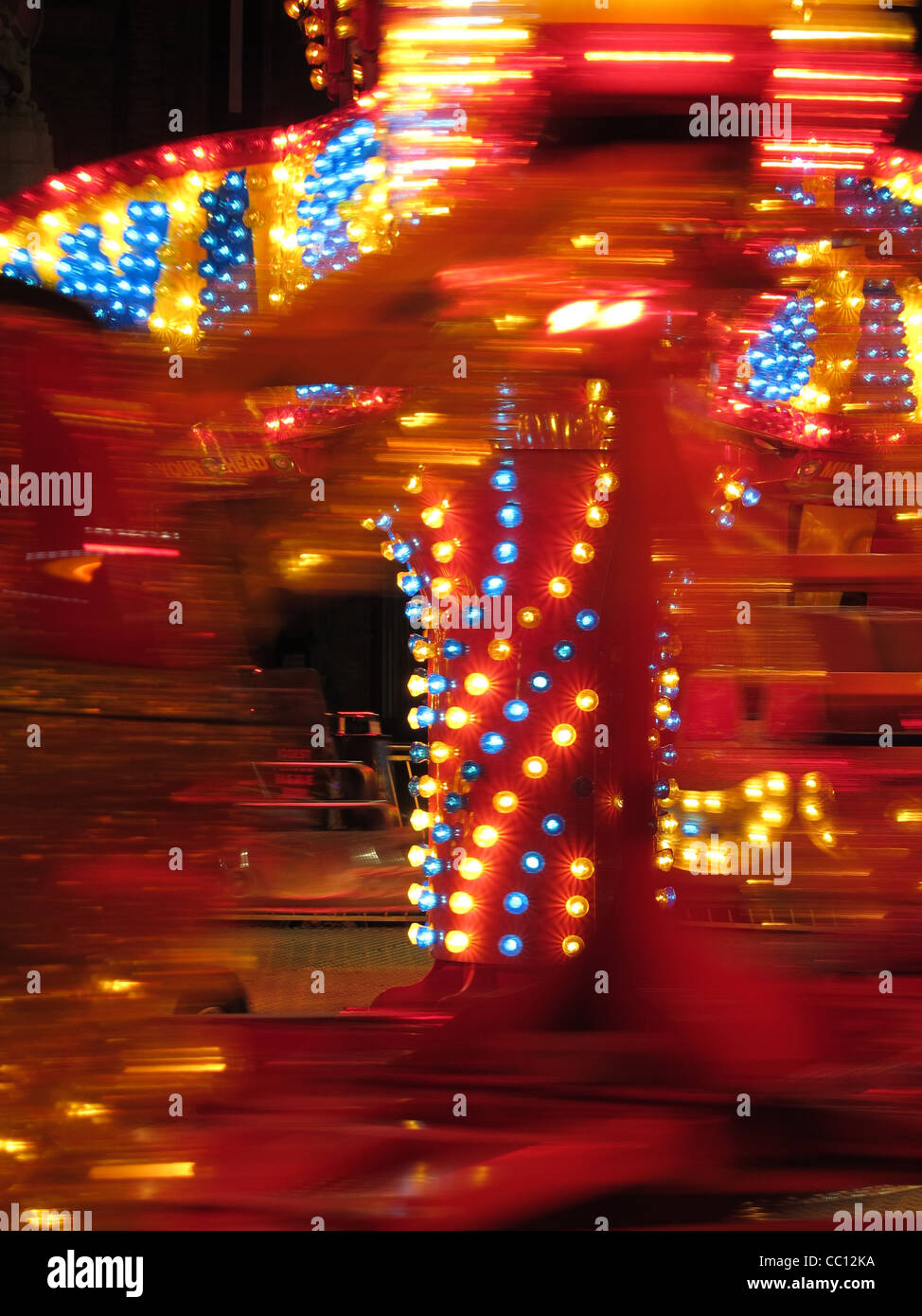 twister fair ground ride at night Stock Photo - Alamy