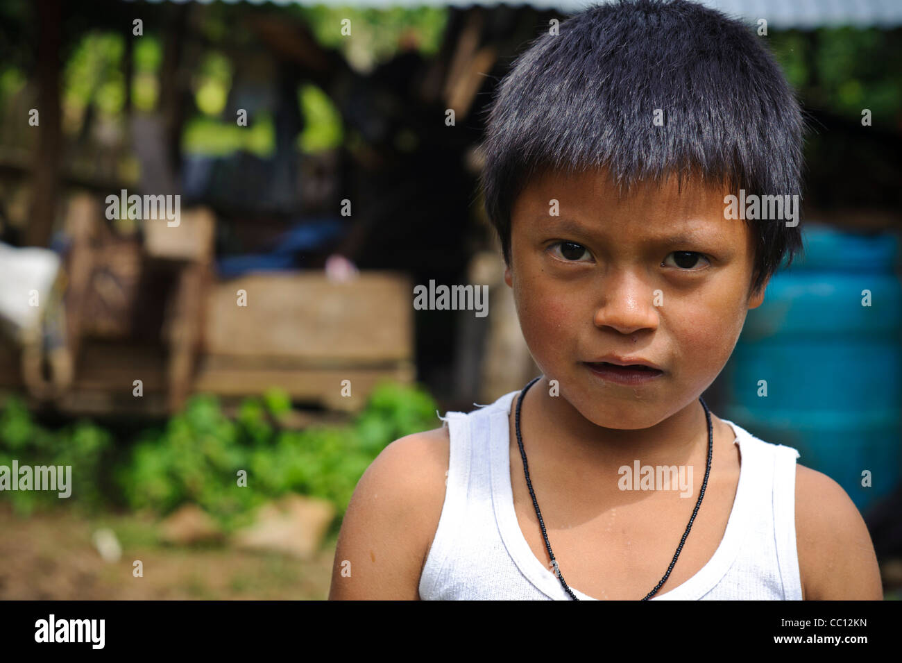 Young boy not smiling in Honduras Stock Photo - Alamy