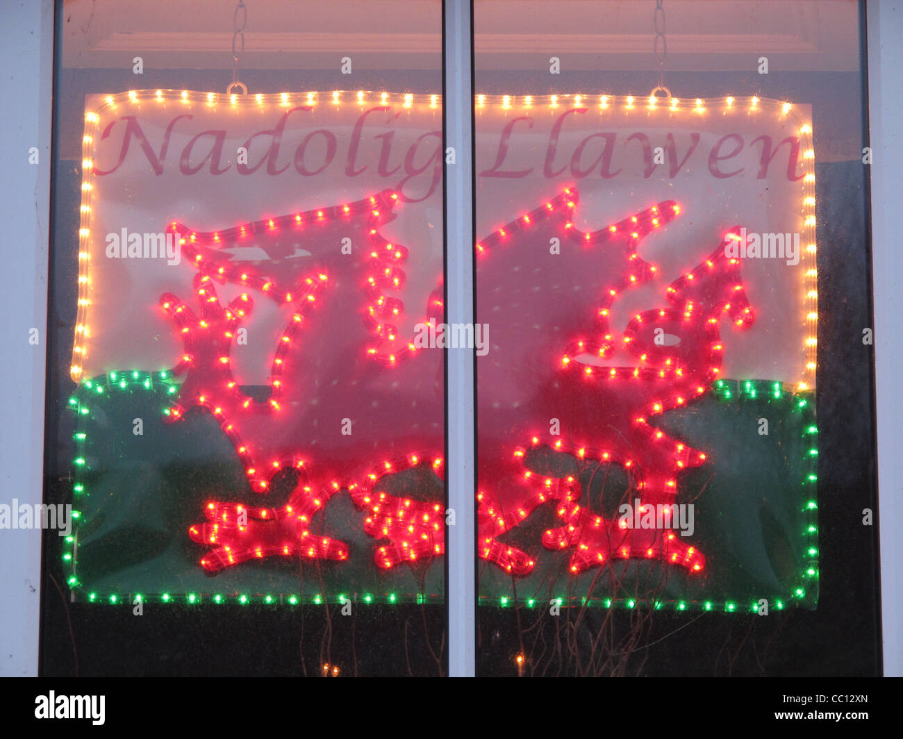 welsh dragon christmas lights in house window in wales great britain uk