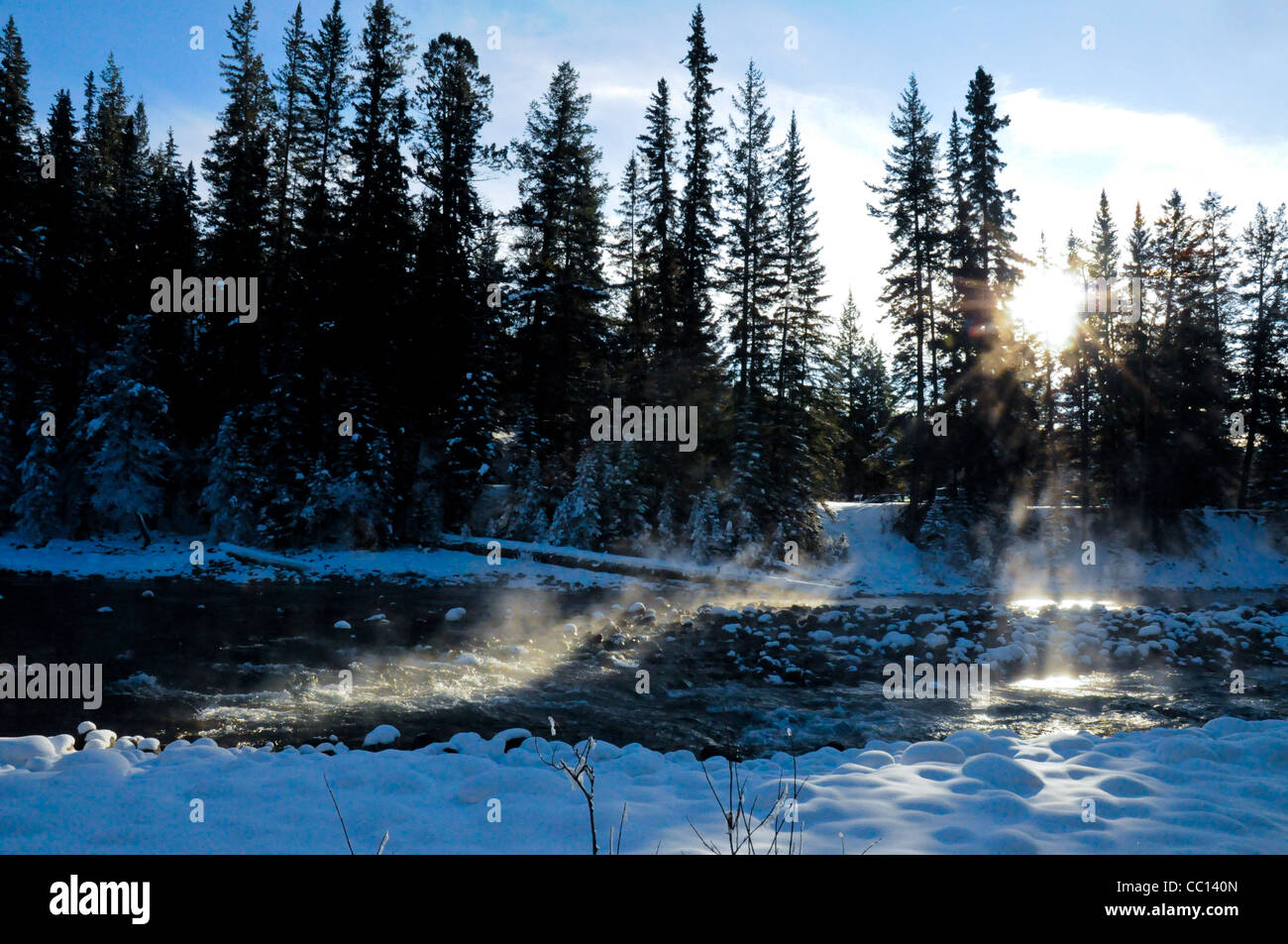 Steaming river in winter due to geological circumstances Stock Photo