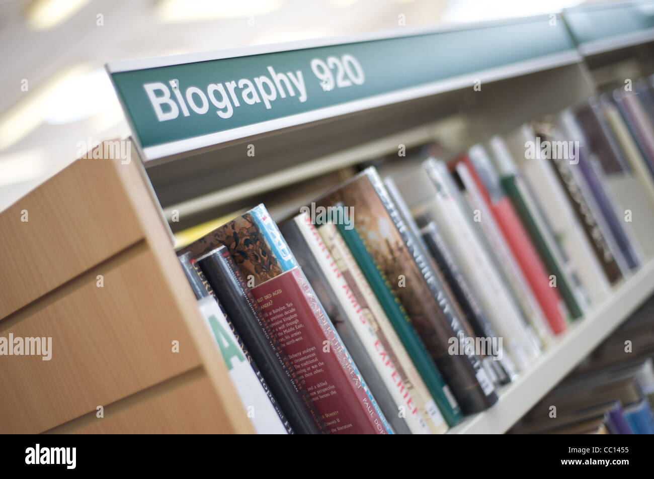 Biography library signage on shelving Stock Photo Alamy