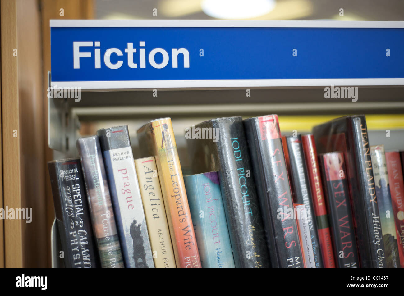 Fiction library signage on shelving Stock Photo