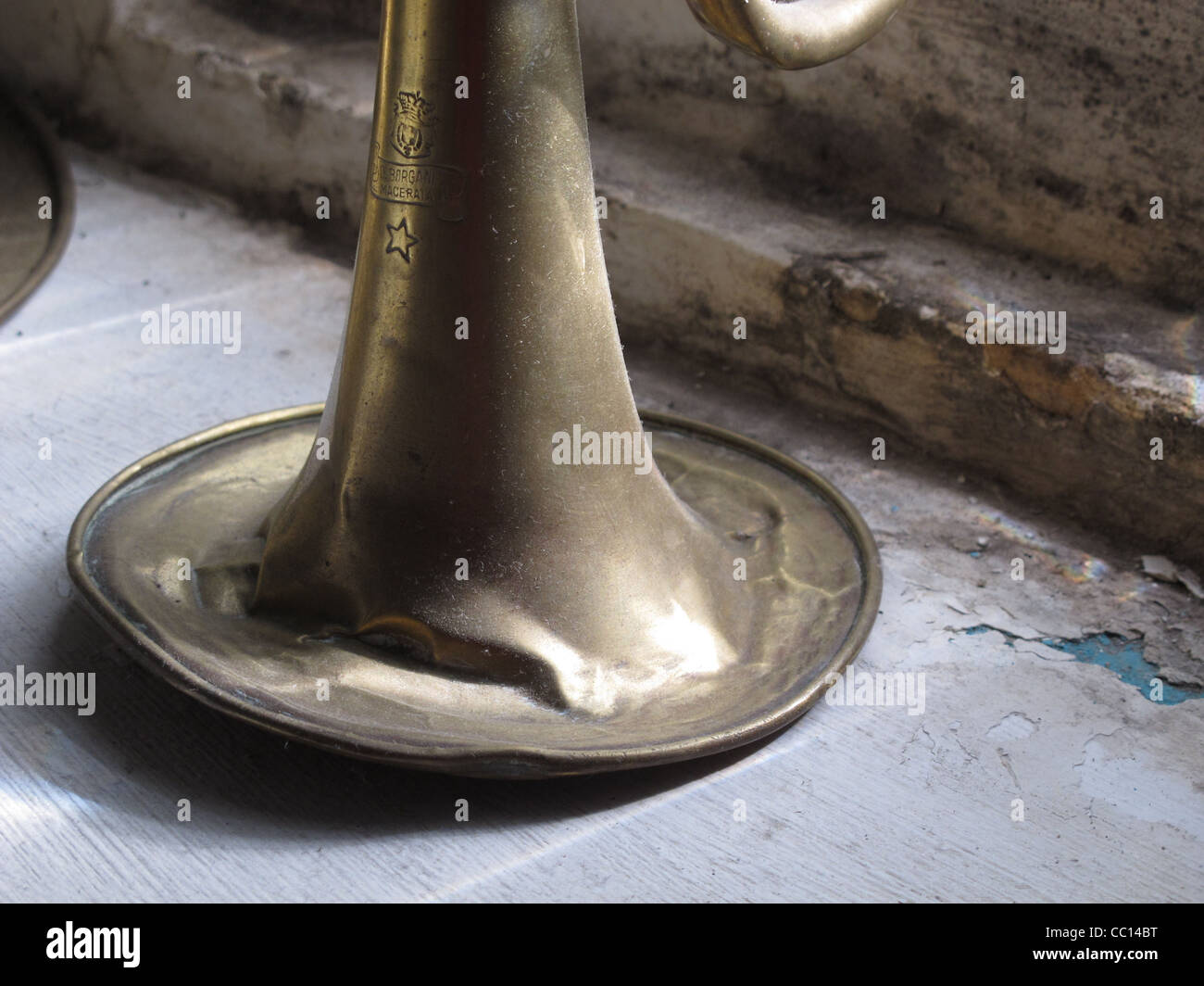 old brass horn trumpet music instrument by window Stock Photo Alamy