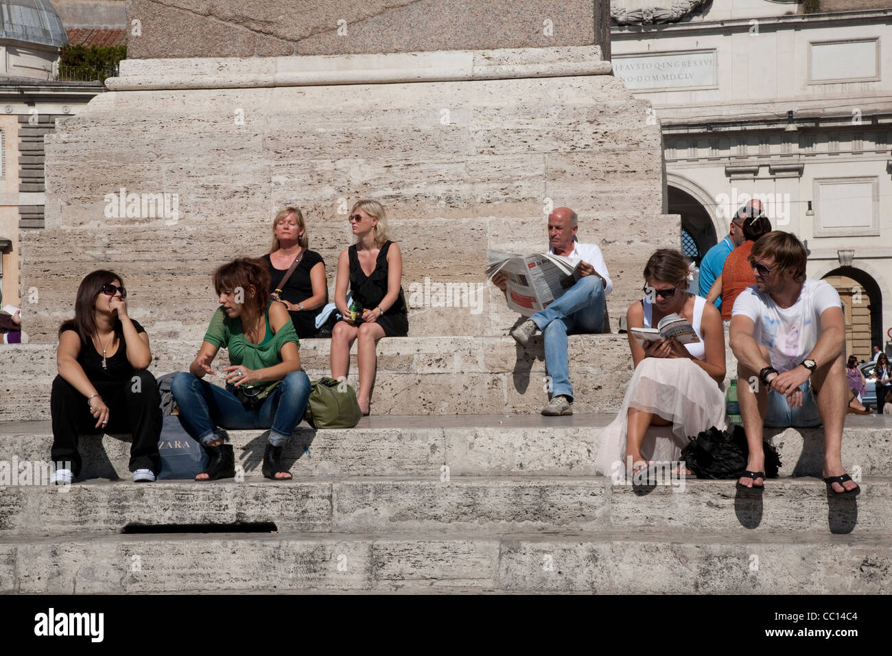 People Sitting in Piazza del Popolo Square; Rome; Italy Stock Photo