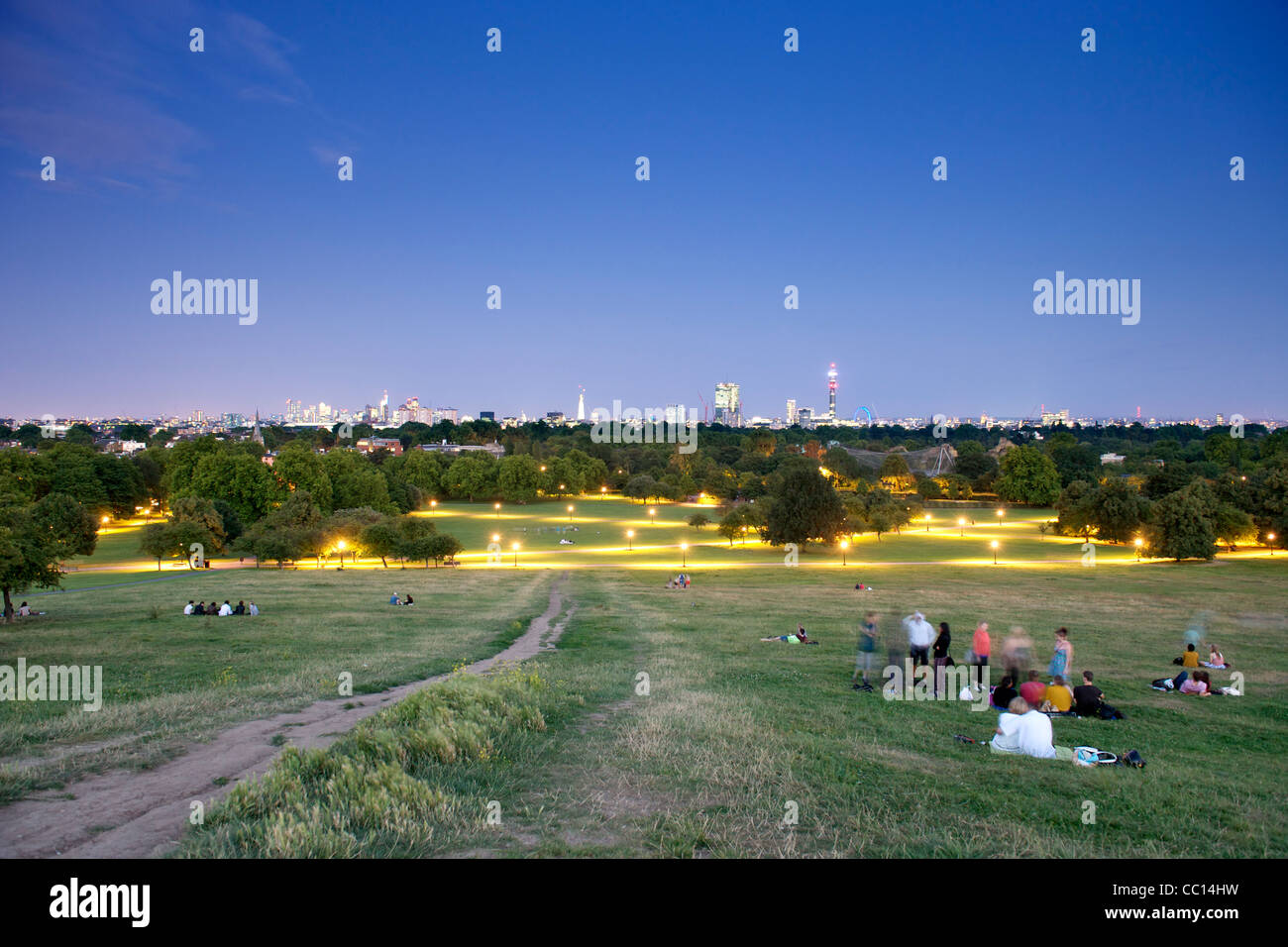 Dusk view of the London skyline from Primrose Hill Park on a summer's evening. Stock Photo