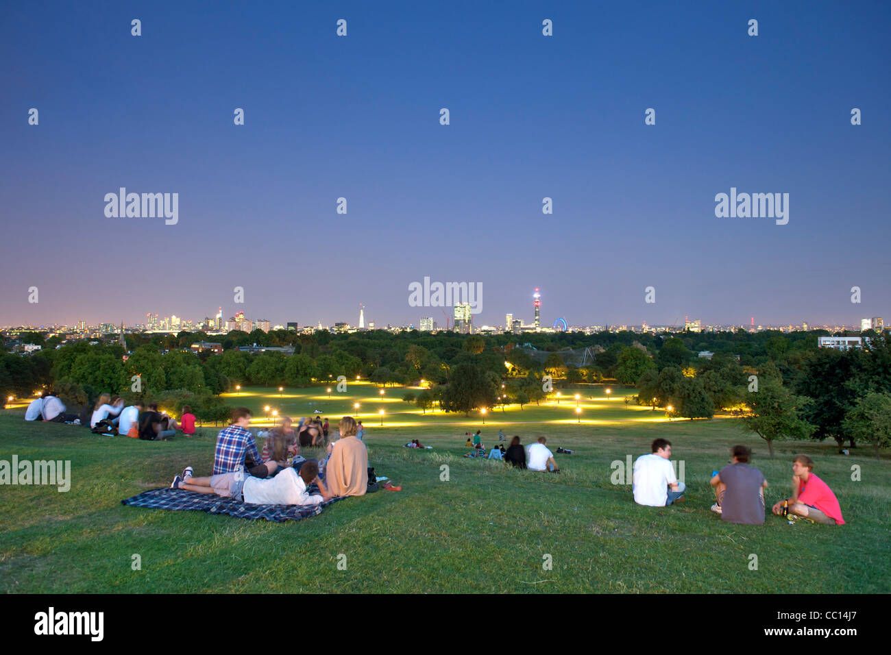 Dusk view of the London skyline from Primrose Hill Park on a summer's evening. Stock Photo
