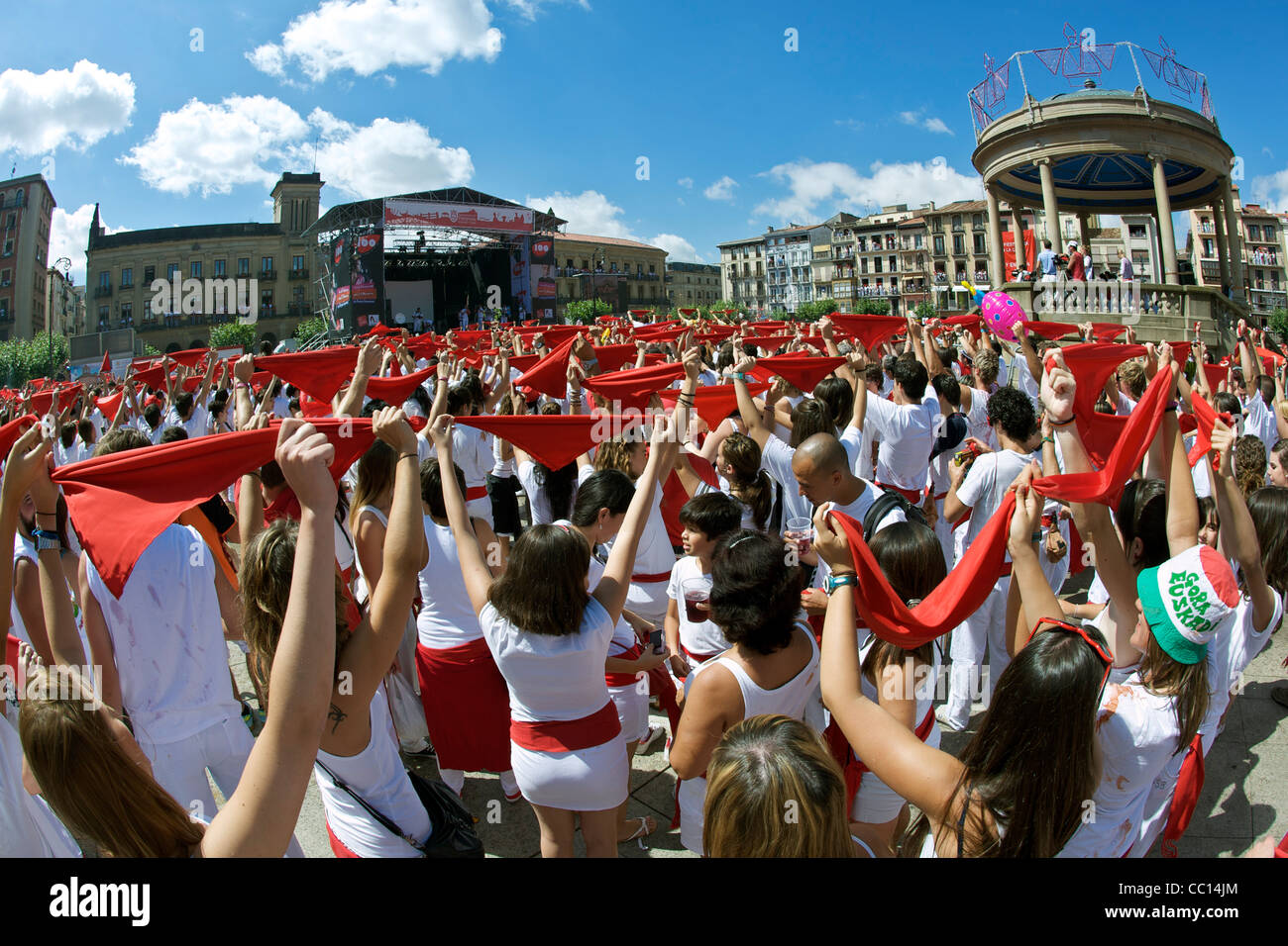 Jubilant crowds at the opening ceremony of the annual festival of San Fermin (aka the running of the bulls) in Pamplona, Spain. Stock Photo