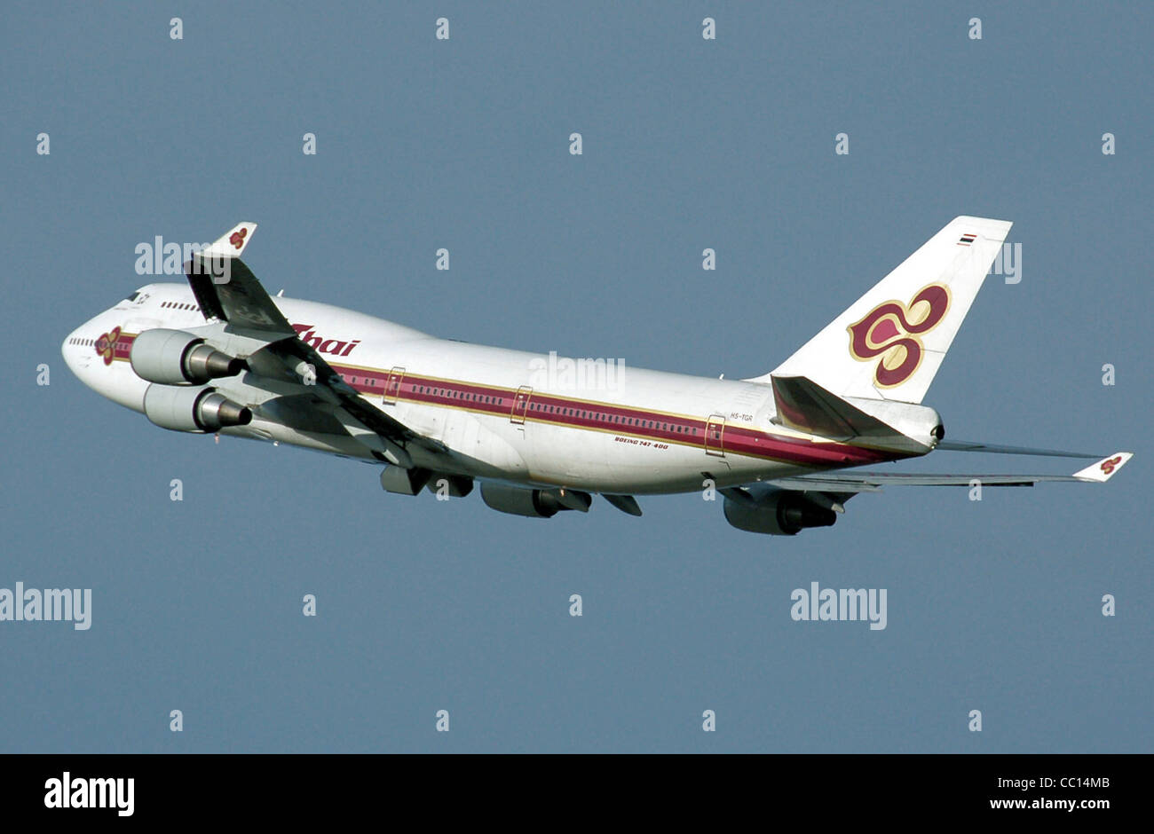 Thai Airways International Boeing 747-400 (HS-TGR) takes off from London Heathrow Airport, England. Stock Photo