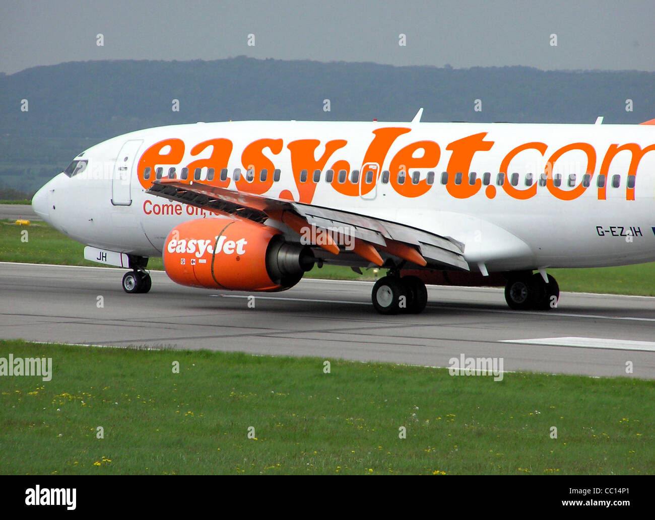 Easyjet Boeing 737-700 (G-EZJH) at the end of the landing run at Bristol International Airport, England. Stock Photo