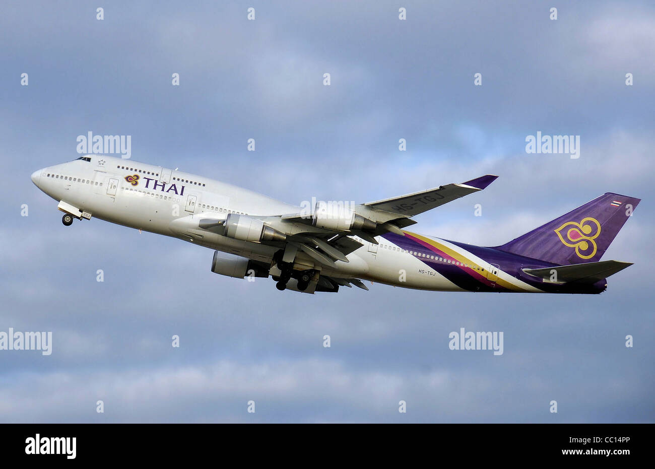 Thai Airways Boeing 747-400 (HS-TGJ) taking off from London Heathrow Airport, England. Stock Photo