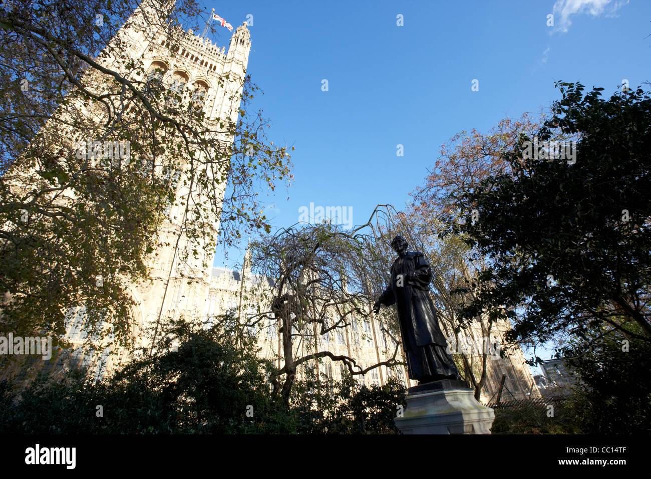 emmeline pankhurst memorial in victoria tower gardens at the palace of westminster houses of parliament buildings London England Stock Photo