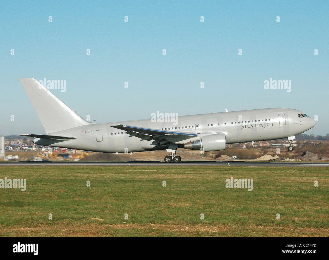 Silverjet Boeing 767-200 (G-SJET) taking off from London Luton Airport, England. Stock Photo