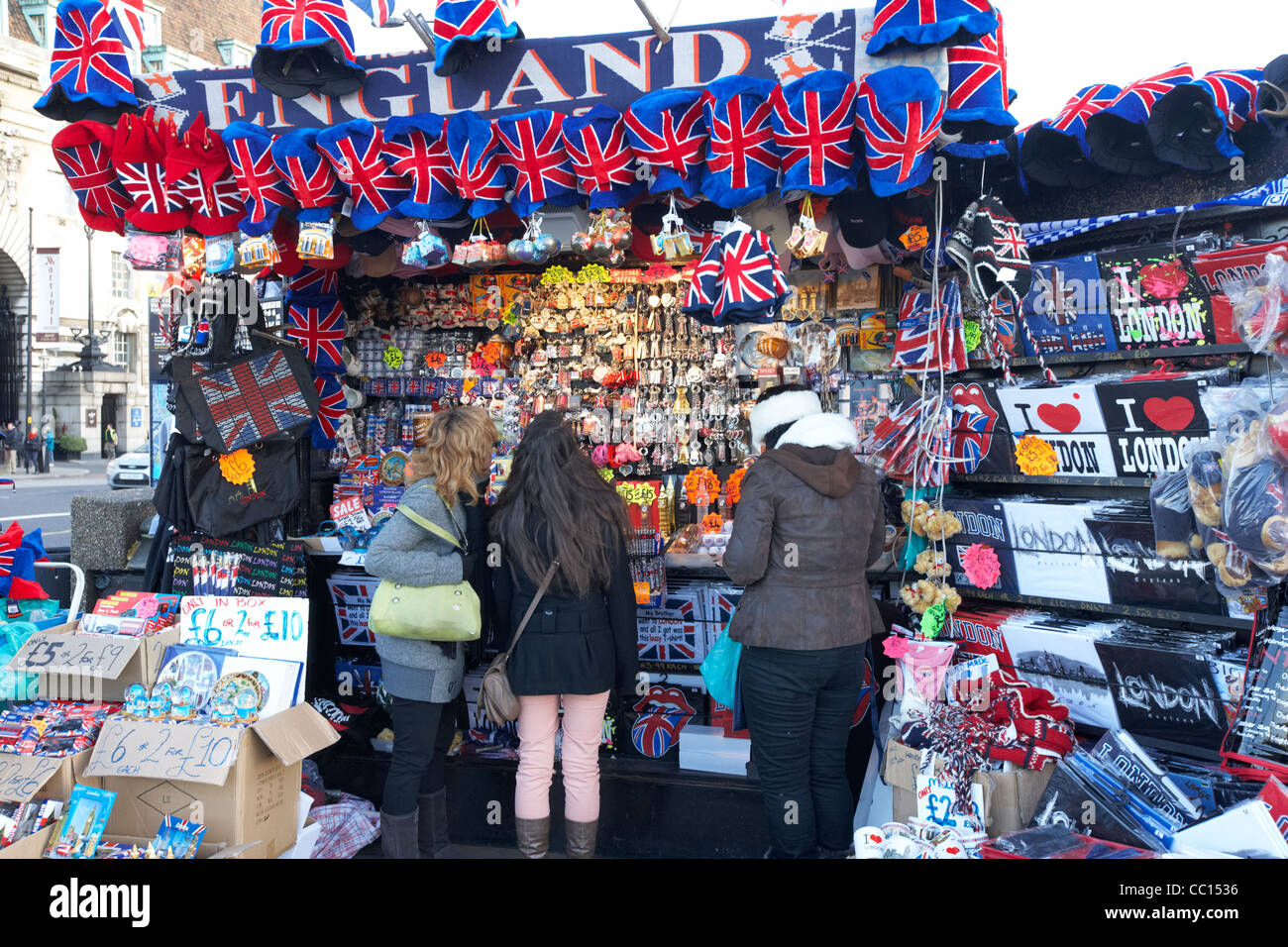 tourists shopping at souvenir stall London England UK United kingdom