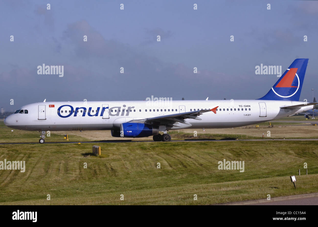 Onur Air Airbus A321-200 (TC-OAN) taxis for take off at Birmingham International Airport, England. Stock Photo
