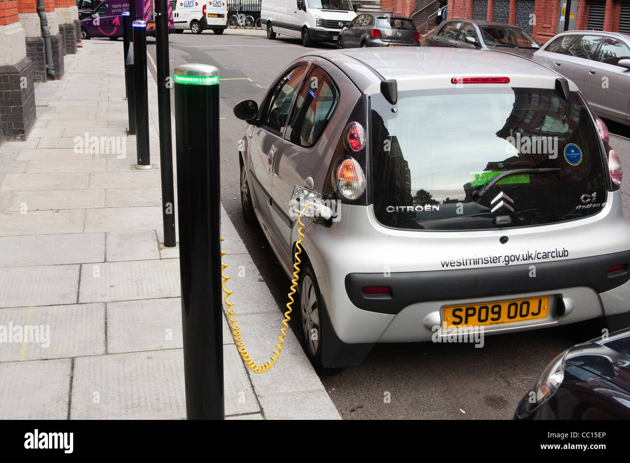 An electric car charging at a charging point in London, UK Stock Photo