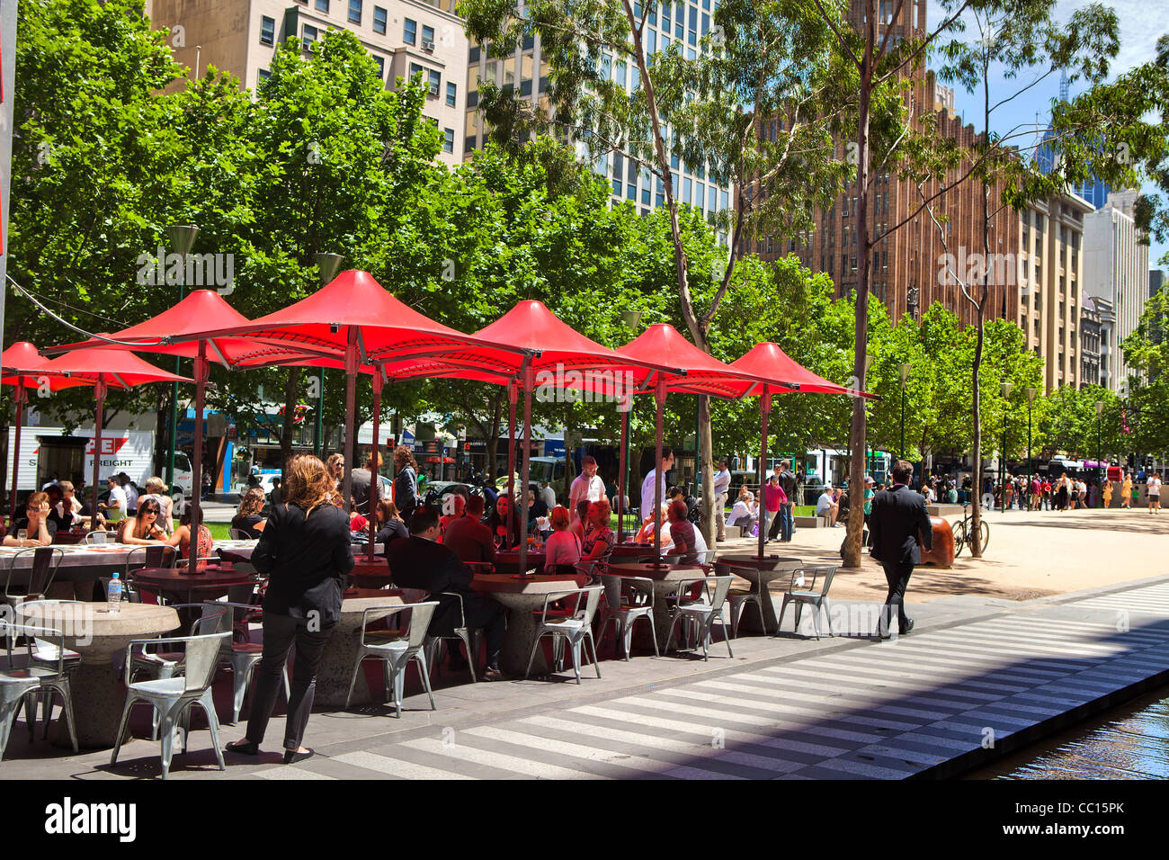 Melbourne city square Australian city center people enjoying the sunny weather in the city square cafe's Australia victoria. Stock Photo
