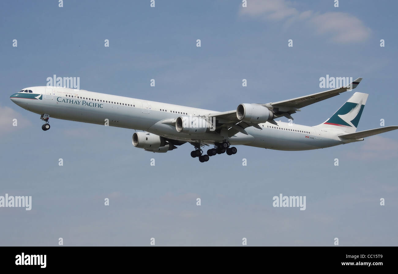 Cathay Pacific Airbus A340-600 (B-HQB) landing at London Heathrow Airport. Stock Photo