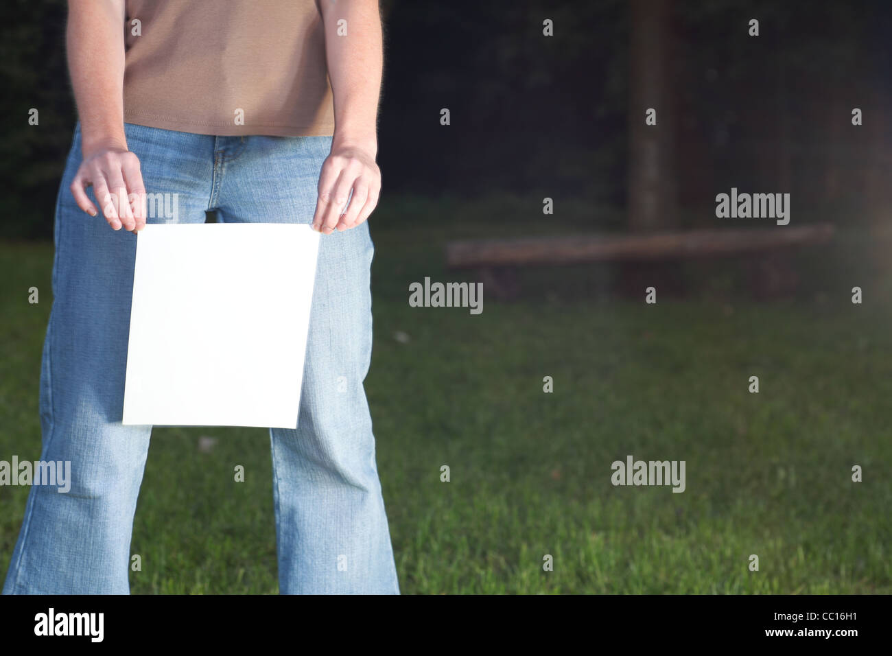 woman with blank paper outdoor Stock Photo - Alamy