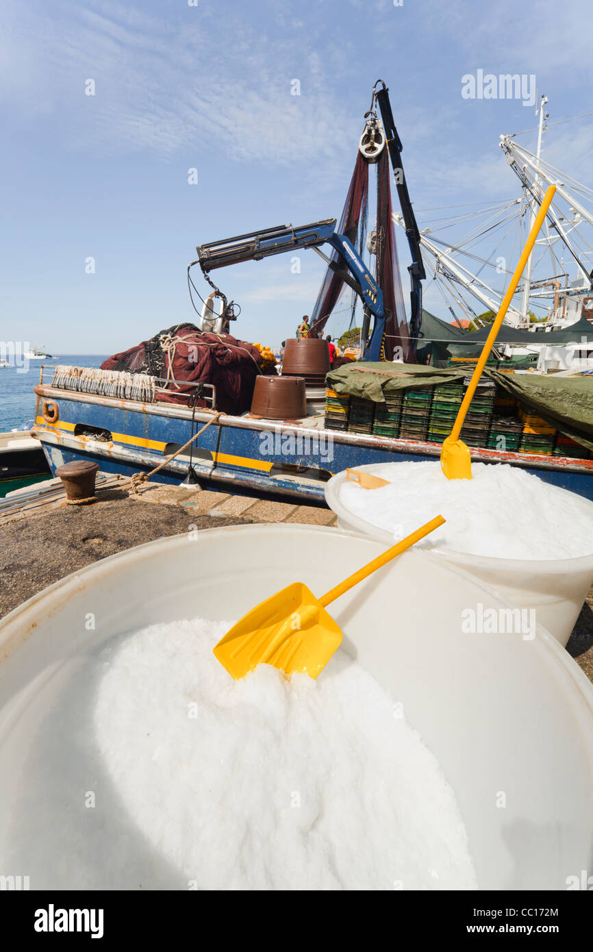 Salt ready, fishing boats moored in Mandre on Pag island, Croatia Stock Photo