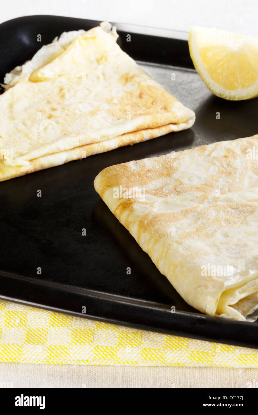 Pancakes with lemon Stock Photo