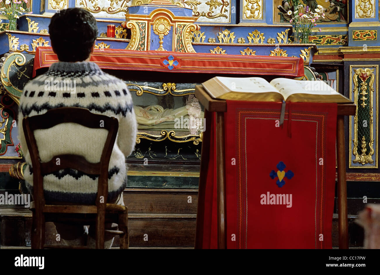 Man Praying in Notre Dame De Chapel in The French Alps