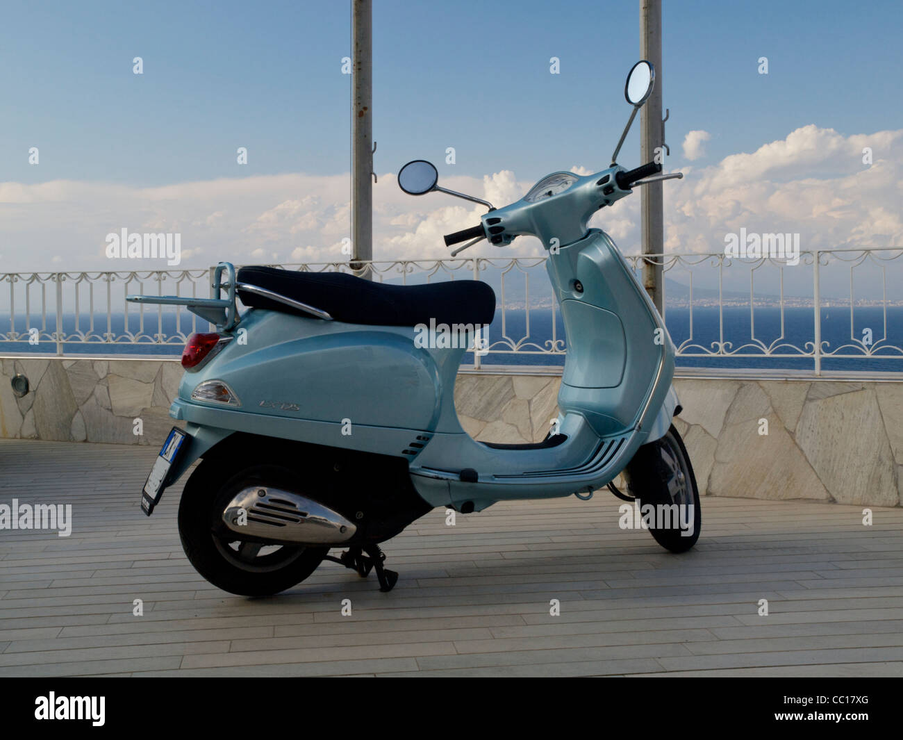 Metallic blue scooter hi-res stock photography and images - Alamy