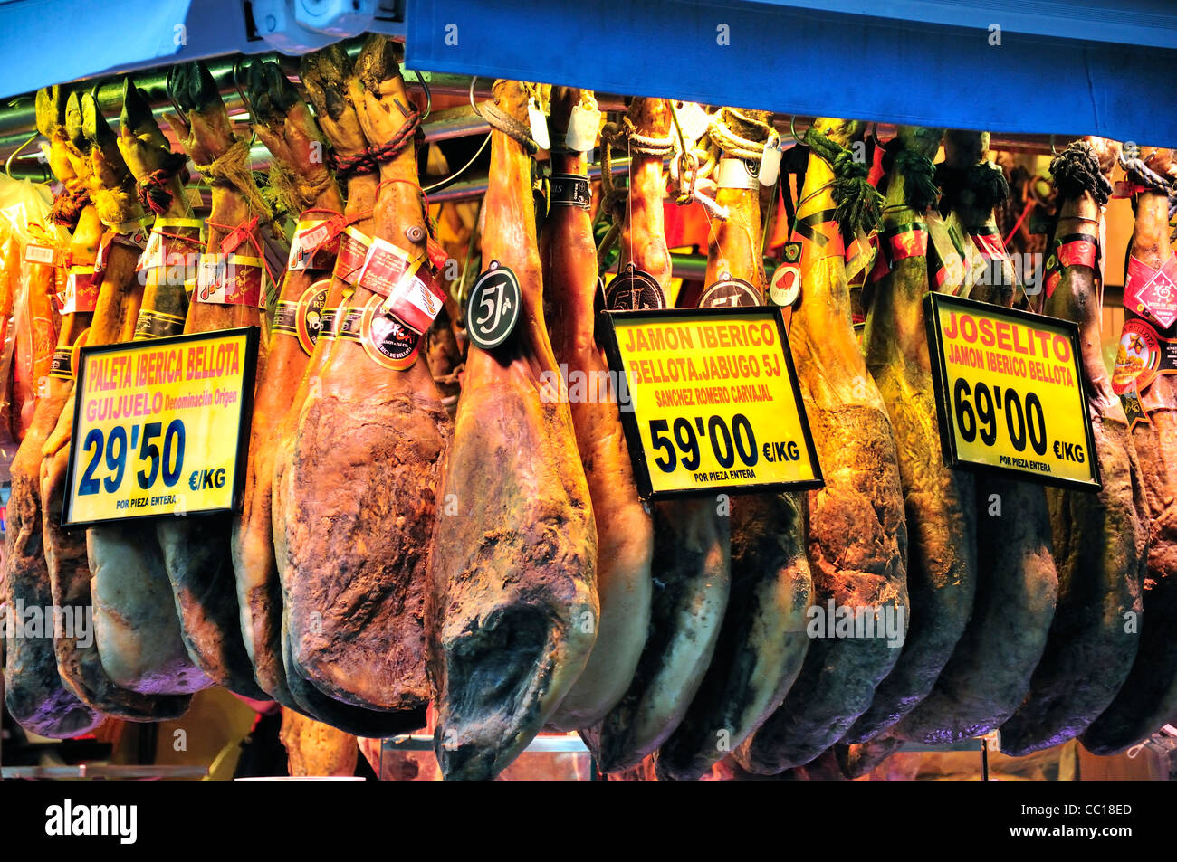 Barcelona, Spain. La Boqueria market. Hams / Jamon hanging up Stock Photo