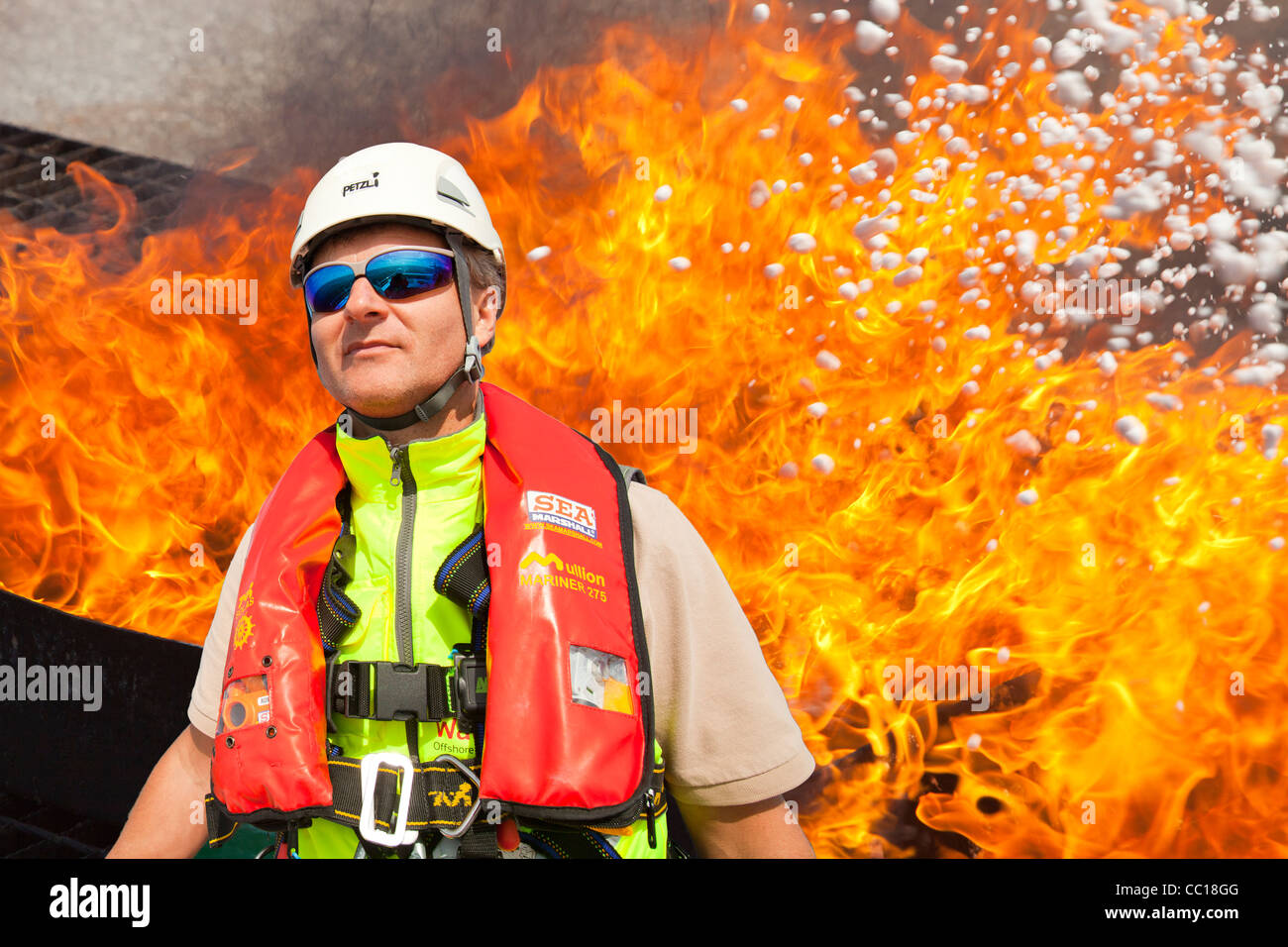 Man with fire extinguisher hi-res stock photography and images - Alamy