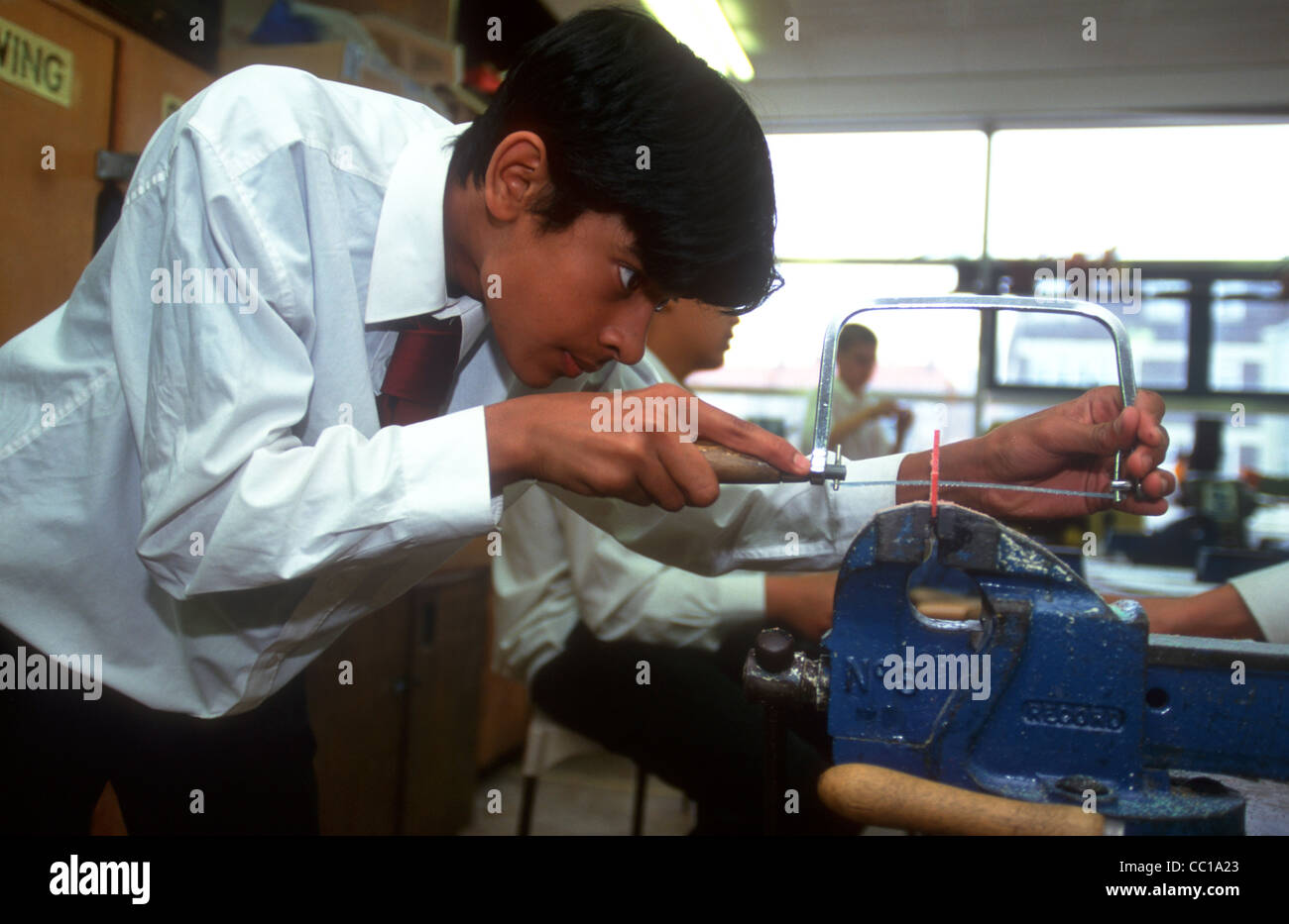 Secondary school pupils in woodwork class, Southwark, London, UK Stock