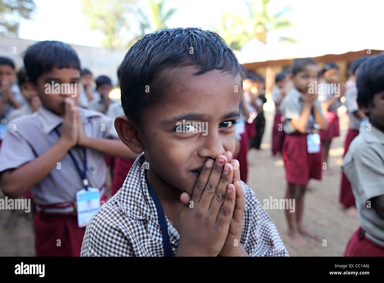 school children during morning prayer Andhra Pradesh South India Stock Photo