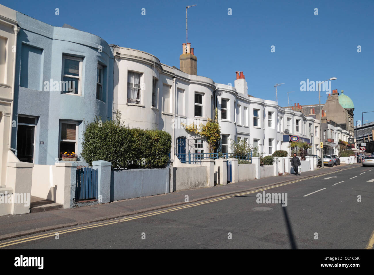 A line of terraced regency two storey houses on Surrey Street, Brighton, East Sussex, UK. Stock Photo