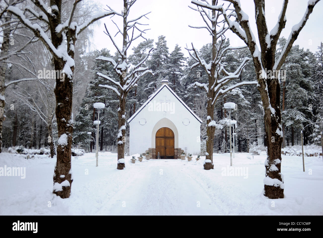 Snowy winter in Sweden, Silverdal cemetery chapel in Sollentuna, near Stockholm. Stock Photo