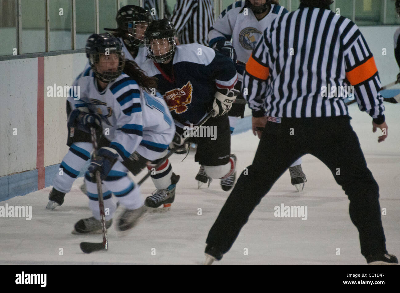 Girls playing hockey Stock Photo