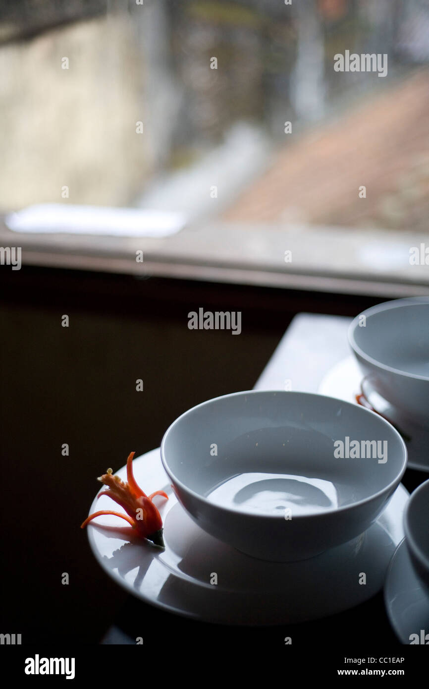 Soup bowls and garnish at the Morning Glory Cooking School in Hoi An, Vietnam Stock Photo