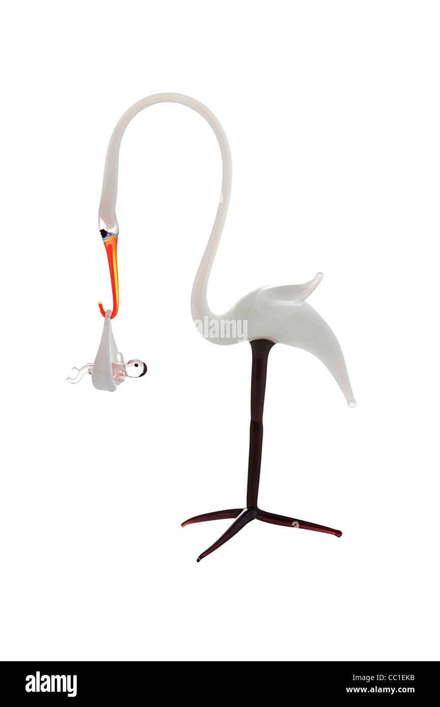 Glass sculpture. Stork with baby. Cut-Out Stock Photo