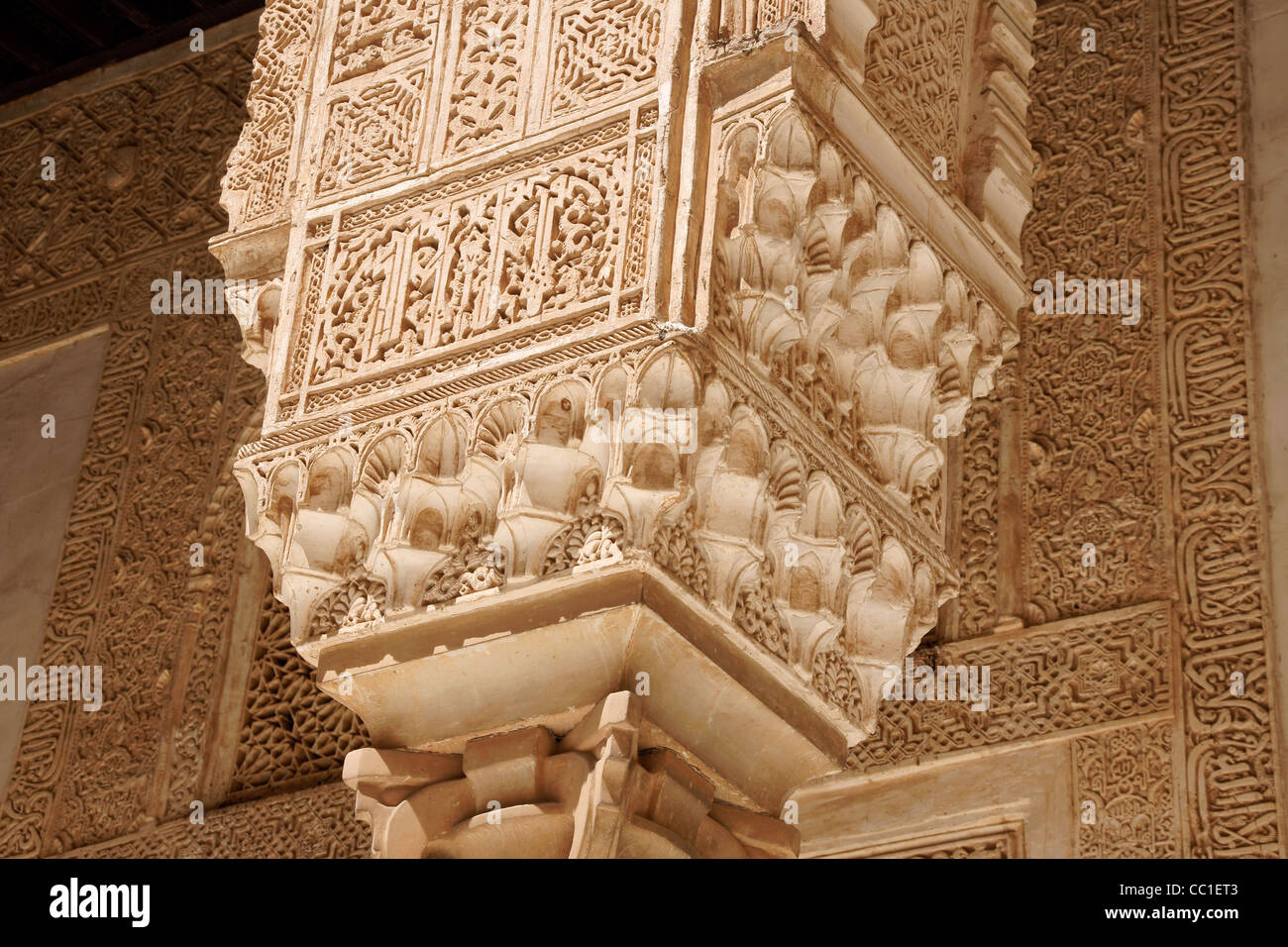 Detail of a capitol with arabic carvings of Nasrid Palaces in the Alhambra of Granada in Andalusia, Spain Stock Photo