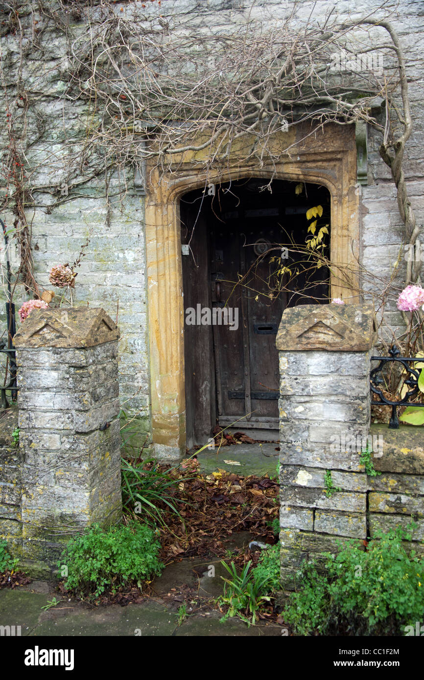 Overgrown doorway of derelict house in Somerton Somerset Stock Photo Alamy