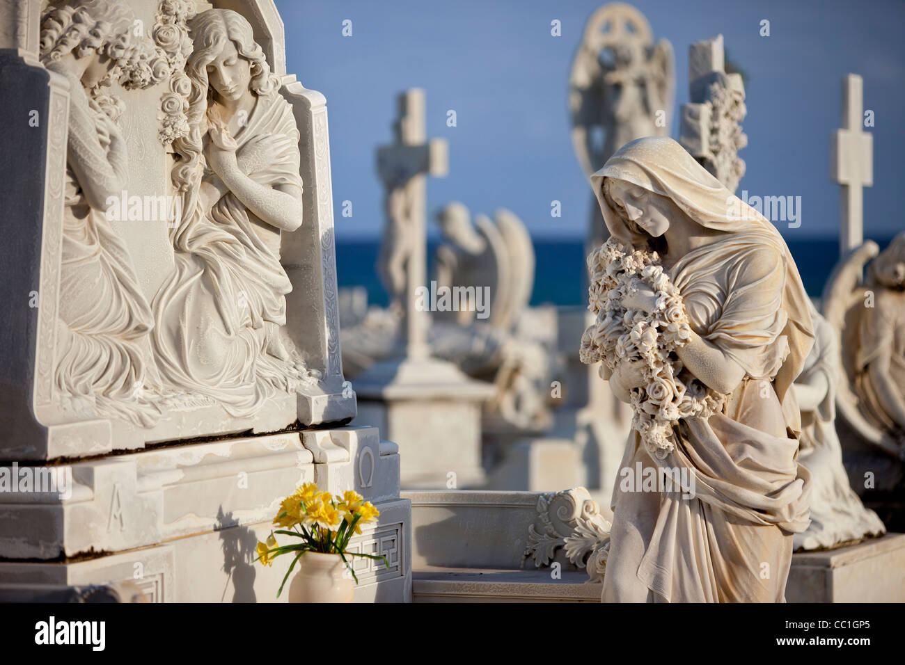 Memorial angel sculptures in historic cemetery in old town San Juan Puerto Rico Stock Photo