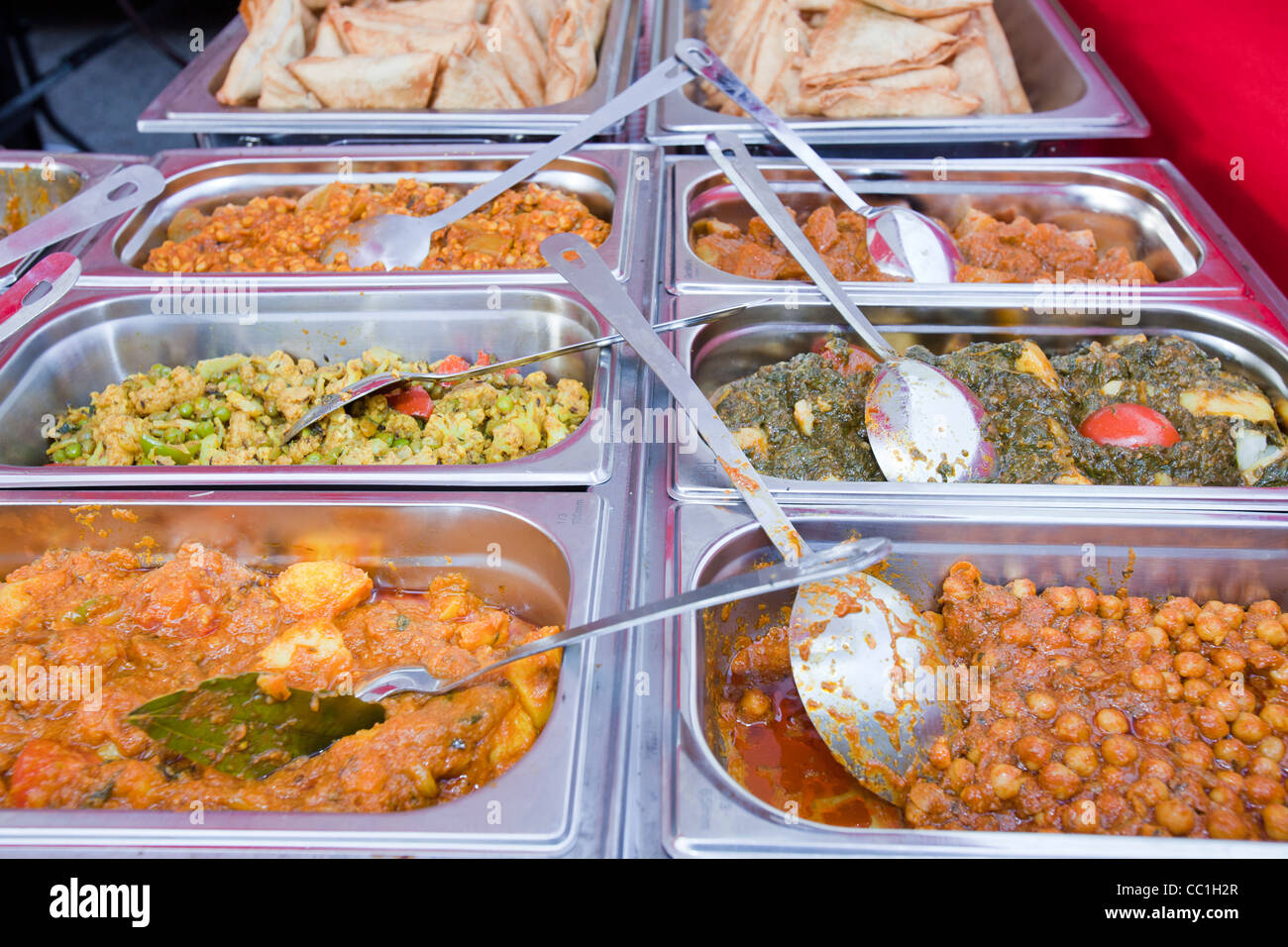 An Indian food stall at a farmers market in Cark in Cartmell, Cumbria, UK. Stock Photo
