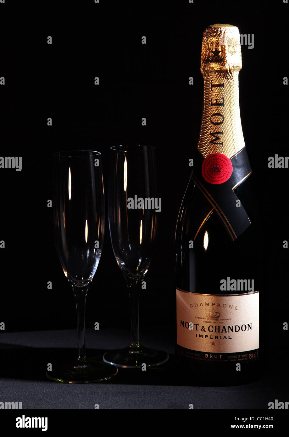 bottle of Moet and Chandon champagne with two flute glasses on black background Stock Photo Alamy
