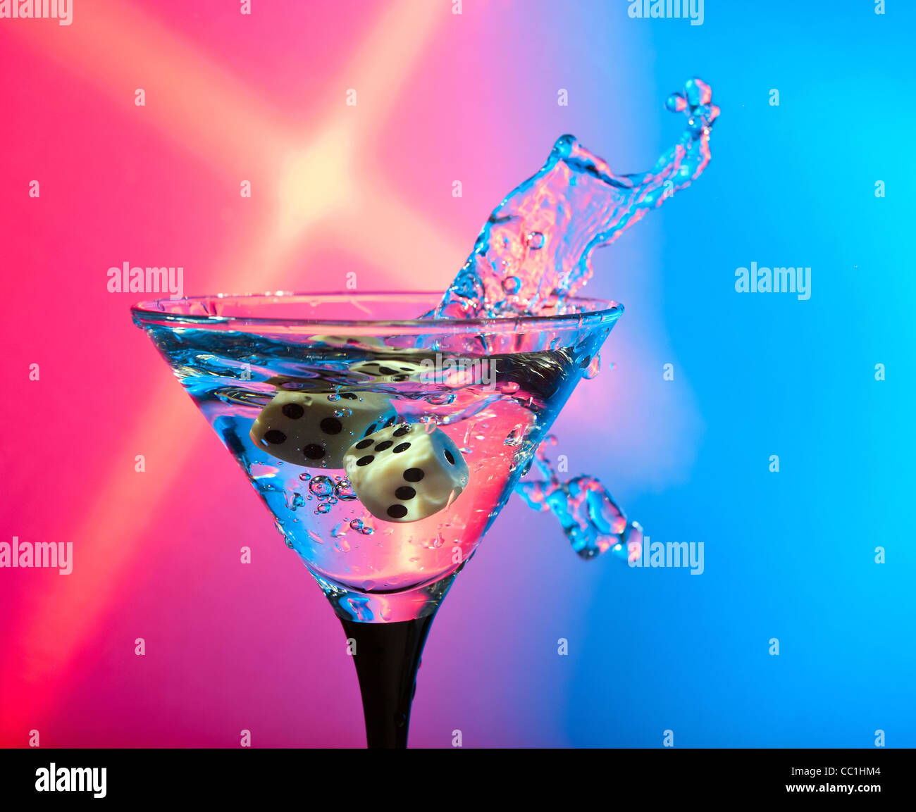 https://c8.alamy.com/comp/CC1HM4/dice-fall-in-a-glass-with-martini-CC1HM4.jpg