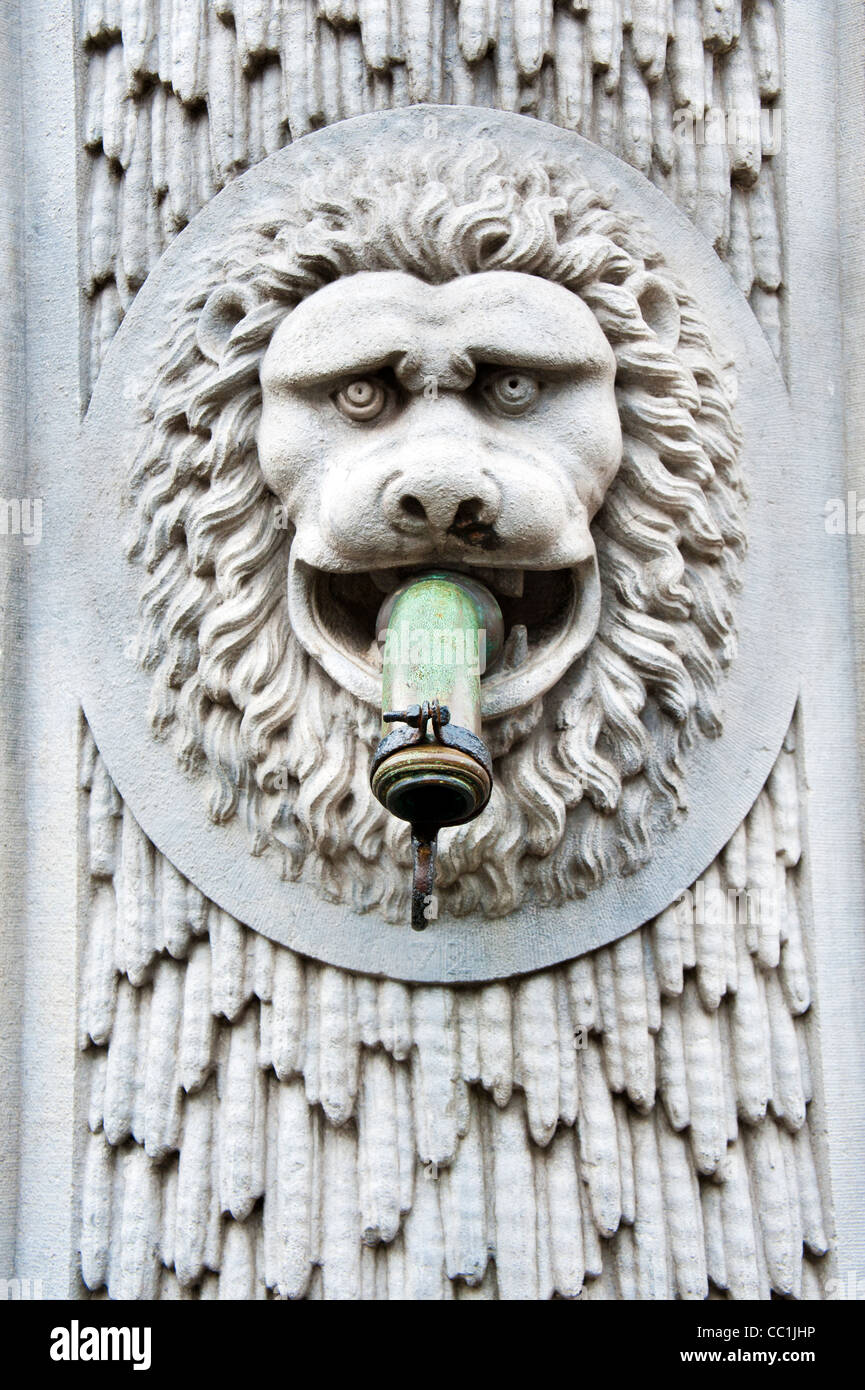 Lion head water pump spout sculpture in Bruges Belgium Stock Photo